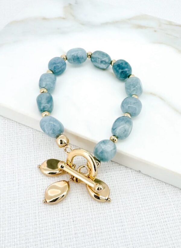 Envy 4358 Gold & blue stone stretch bracelet with t-bar and charms